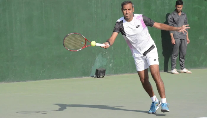 Pakistan’s Davis Cup stalwart Aqeel Khan while taking a shot in this image released on December 17, 2023. — Facebook/Pakistan Tennis Federation