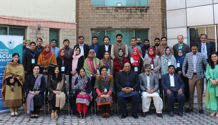 The image released on Dec 7, 2023 shows the participants of the National Faculty Development Programme (NFDP-2023) launched by the National Academy of Higher Education (NAHE) at the HEC headquarters in Islamabad. — Facebook/HECPakistan2002