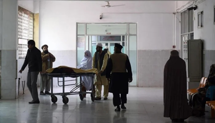 This photo shows relatives turning to a man who was treated at a hospital. — AFP/File