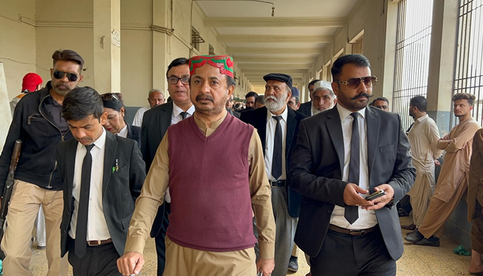 Pakistan Tehreek-e-Insaf (PTI) Sindh president Haleem Adil Sheikh (C) in Courts premises, Karachi on January 2, 2024. —Facebook/Haleem Adil Sheikh