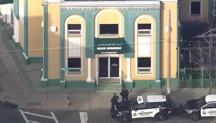 This still shows New Jersey police officials standing outside the Masjid Muhammad-Newark, New Jersey on January 3, 2023. — YouTube/LiveNOW from FOX