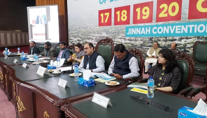 This image released on October 18, 2023, shows CDA officials during a four-day auction of plots in Islamabad. — Facebook/Capital Development Authority - CDA, Islamabad