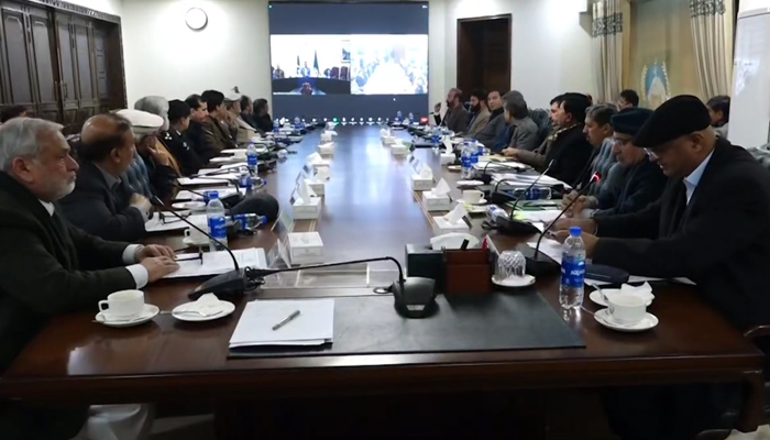 Caretaker Chief Minister Justice (R) Syed Arshad Hussain Shah chairs a meeting from Islamabad via a video link on January 8, 2024, in this still. — Facebook/Government of Khyber Pakhtunkhwa