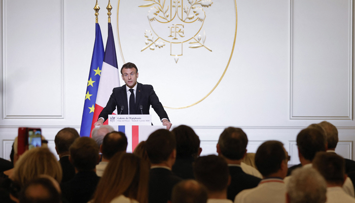 French President Emmanuel Macron addresses members of the French bakery and pastry federation during the traditional Epiphany cake ceremony at the Elysee Palace in Paris, on January 5, 2024. — AFP