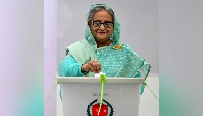 Bangladeshs PM Sheikh Hasina casts her vote at a polling station in Dhaka on January 7, 2024.— AFP