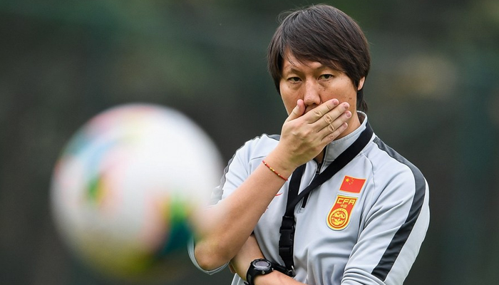 Newly-elected Chinese mens national football team head coach Li Tie reacts during the training session in Foshan, south Chinas Guangdong Province. — Xinhua/File