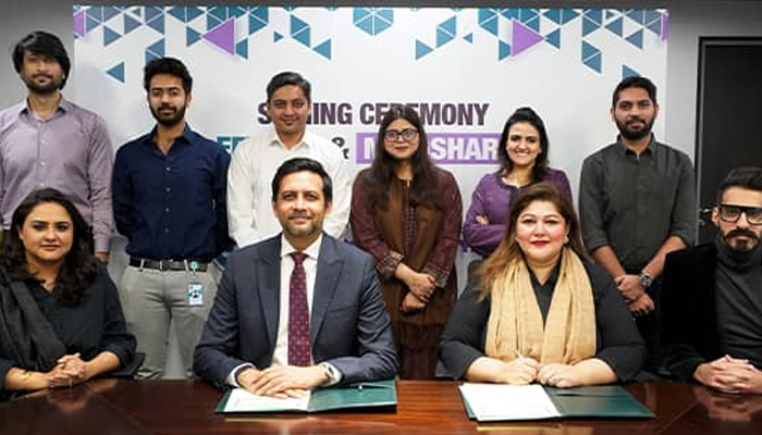 CEO and MD EFU Life Mr. Mohammed Ali Ahmed (2nd L) and Amna Khatib Paracha, CDO of GroupM and MD of Mindshare (2nd R) take a pose along with the staff on January 10, 2024. — Facebook/EFU Life Assurance Ltd