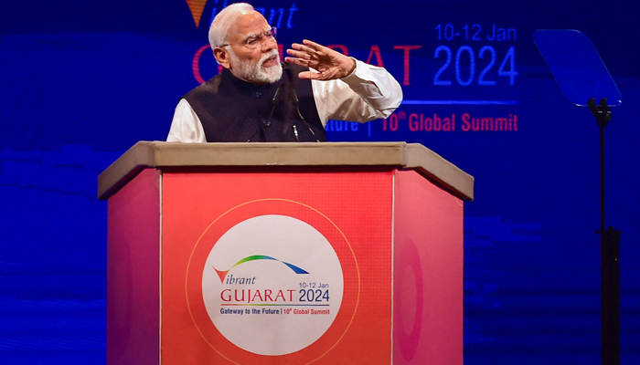 Indias Prime Minister Narendra Modi addresses a gathering during the inaugural session of Vibrant Gujarat Global Summit 2024, in Gandhinagar on January 10, 2024. — AFP