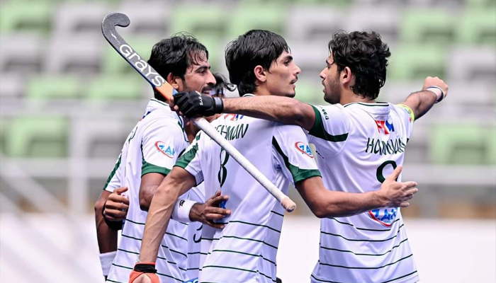 Pakistani hockey team players celebrate during a match on December 7, 2023. — Facebook/Pakistan Hockey Federation