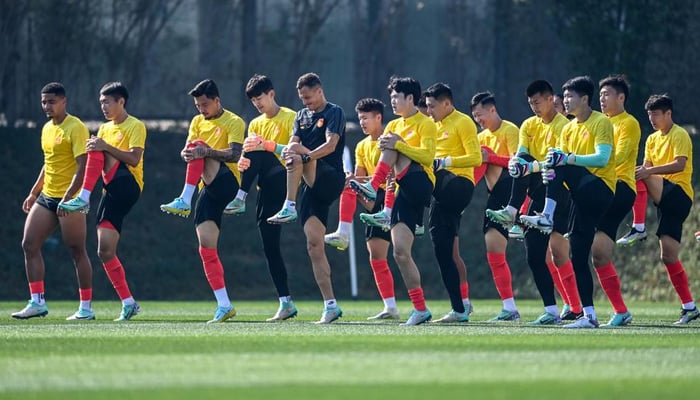 China players take part in a training session ahead of the AFC Asian Cup in Doha, Qatar on January 11, 2024. — Xinhua