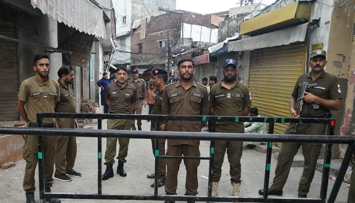 Punjab police stand guard in the street of Lahore on July 28, 2023. —Facebook/Capital City Police Lahore