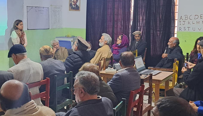 A speaker talks during the Gandhara Artisan the Untold Story screening at Taxila Choupal on January 1, 2024. — Facebook/Department of Media Studies, Art and Design of Lahore School of Economics