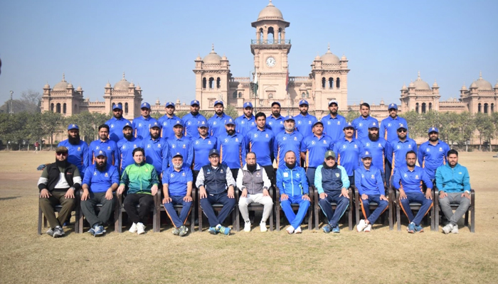 This photo released on January 11, 2024 shows officials from PCB and the participants of the coaching course in Peshawar posing for a group picture. — PCB