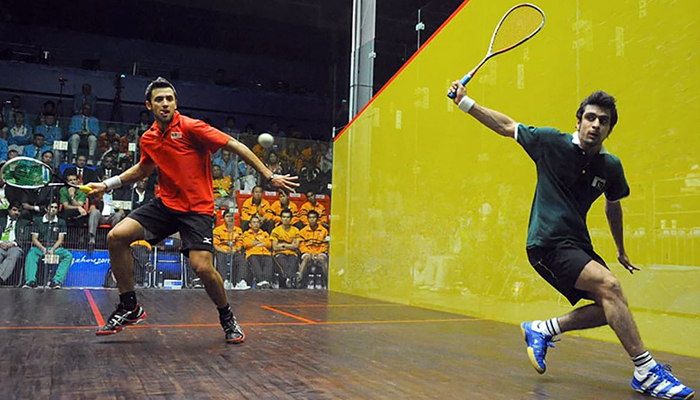 Two squash players can be seen in this image.—AFP/File