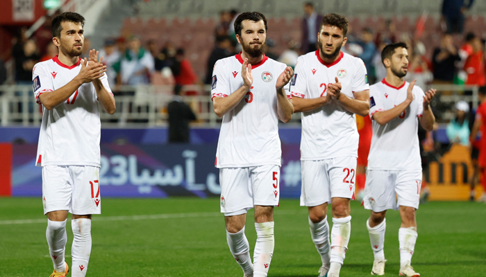 Tajikistan´s players salute the attendance after the end of the Qatar 2023 AFC Asian Cup Group A football match between China and Tajikistan at the Abdullah bin Khalifa Stadium in Doha on January 13, 2024. —AFP