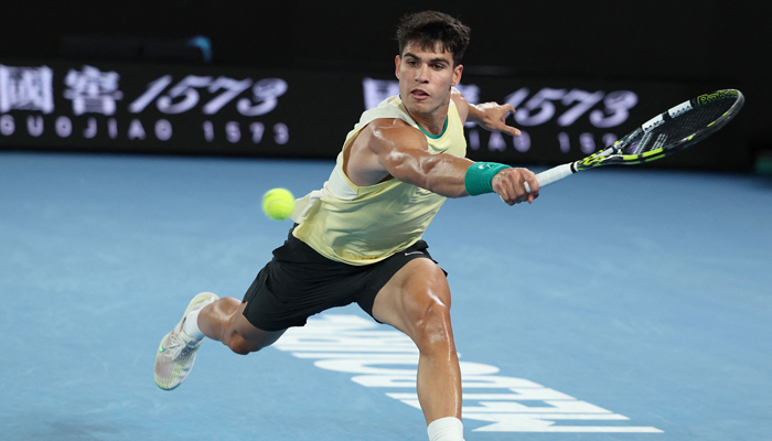 Spain´s Carlos Alcaraz hits a return against France´s Richard Gasquet during their men´s singles match on day three of the Australian Open tennis tournament in Melbourne on January 16, 2024. — AFP