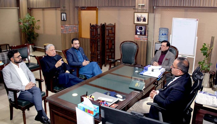 SCCI President Fuad Ishaq speaks while meeting with the Chief Commissioner RTO Peshawar Zafar Iqbal at the RTO on January 19, 2024. — Facebook/Sarhad Chamber of Commerce & Industry