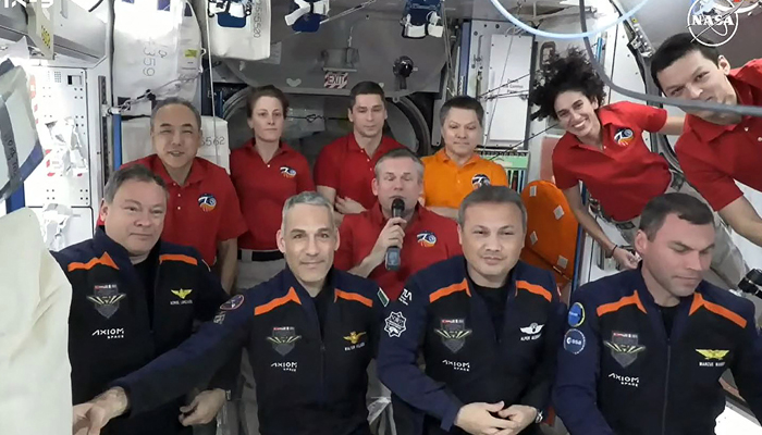 the Axion Mission 3 (Ax-3) members (L-R, front) Commander Michael LÃ³pez-AlegrÃa of Spain, Pilot Walter Villadei of Italy, Mission Specialist Alper GezeravcÄ of Turkey, and Mission Specialist Marcus Wandt of Sweden are joined by the Expedition 70 crew inside the International Space Stations (ISS) Harmony module on arrival on January 20, 2024. — AFP