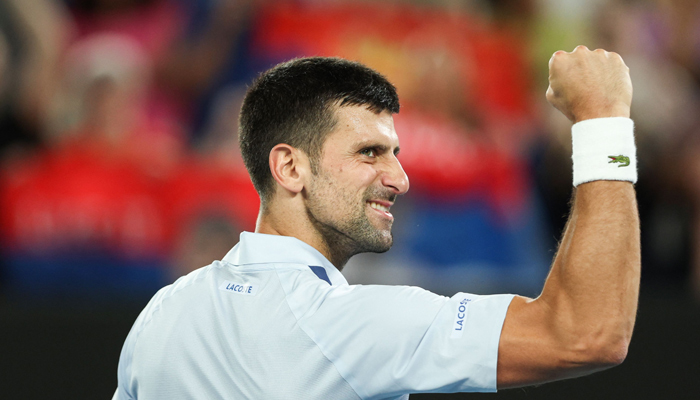 Serbia´s Novak Djokovic celebrates after victory against France´s Adrian Mannarino during their men´s singles match on day eight of the Australian Open tennis tournament in Melbourne on January 21, 2024. — AFP