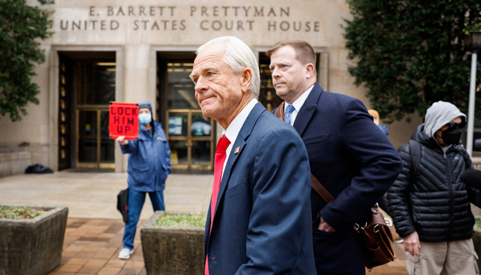 Peter Navarro (L), a former advisor to former US President Donald Trump, departs the E Barrett Prettyman Courthouse on January 25, 2024 in Washington, DC. — AFP