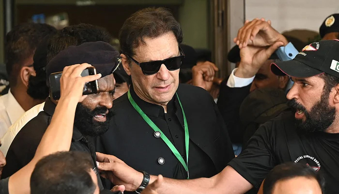 Former prime minister Imran Khan leaves after appearing in the Supreme Court in Islamabad on July 24, 2023. — AFP