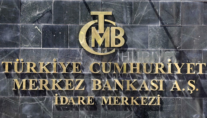 The logo of the Central Bank of the Republic of Türkiye (CBRT) is seen at the entrance of its headquarters in Ankara, Türkiye, Aug. 14, 2018. — AFP