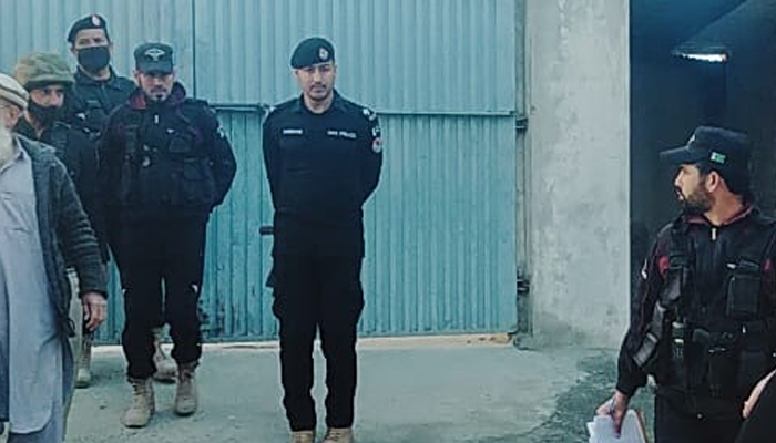 KP police personnel stand guard to perform their duty at Lower Deer on February 8, 2024. — Facebook/Khyber Pakhtunkhwa Police
