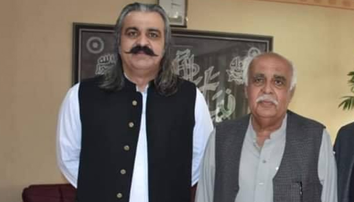 Late Major (R) Aminullah Khan Gandapur (R) along with his son former federal minister Ali Amin Gandapur can be seen in this image. — Facebook/Ali Amin Khan Gandapur