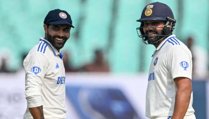 Captain Rohit Sharma (R) and middle-order batter Ravindra Jadeja. — AFP