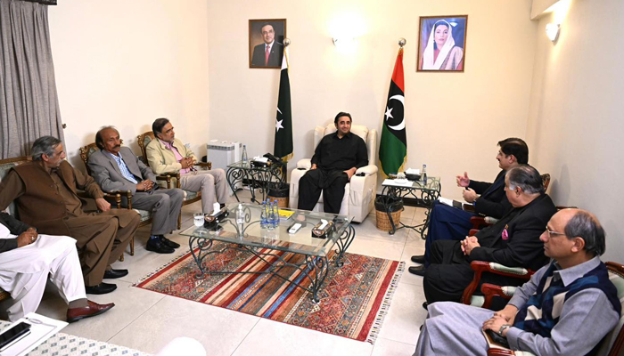 PPP Chairman Bilawal Bhutto-Zardari listens to former CM Murad Ali Shah after his meeting with the committee of the PMLN on federal government formation on February 15, 2024. — Facebook/Pakistan Peoples Party - PPP