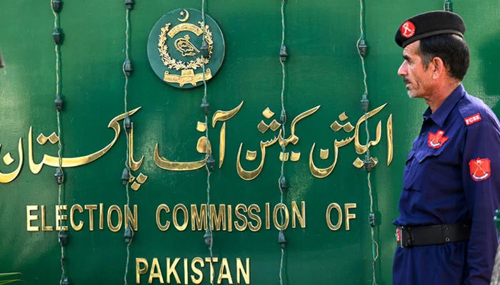 A security personnel stands guard at the headquarters of Election Commission of Pakistan in Islamabad, Pakistan on September 21, 2023. — AFP