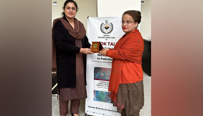 Executive Director Dr Asma Khawaja presents the shield to Dr. Sadia Nasir on February 19, 2024. — Facebook/CISS AJK