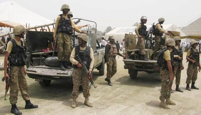 Pakistani soldiers stand guard in Khyber-Pakhtunkhwa. — AFP/File