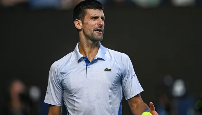 Novak Djokovic reacts while playing against Jannik Sinner during the Australian Open semi-final. — AFP/File
