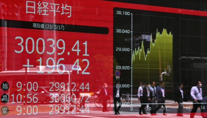 A stock board showing the 225-issue Nikkei average in Tokyo. — AFP/File