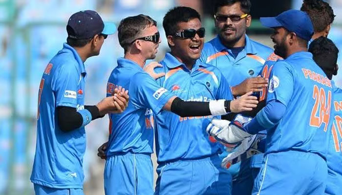 Indian blind cricket team celebrates during the cricket match. — AFP/File