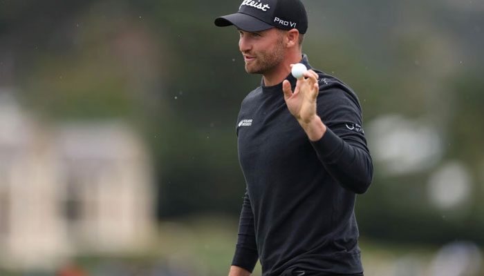 Wyndham Clark of the United States acknowledges the crowd after making the course record low score of 60 at the Pebble Beach Pro-Am. — AFP/File