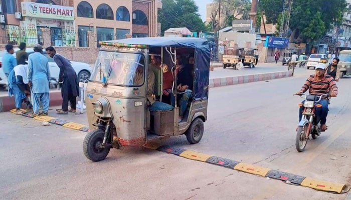 A rickshaw is seen passing over a speedbreaker in Pakistan. — Facebook/Cantonment Board Hyderabad - CBH
