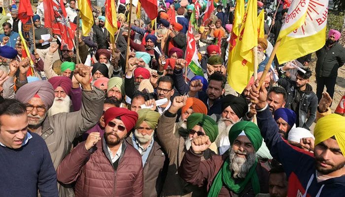 Farmers shout slogans during a protest demanding minimum crop prices in Amritsar on February 13, 2024. — AFP