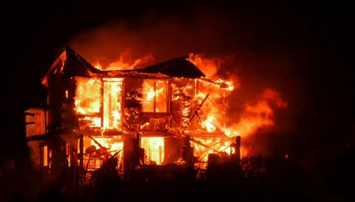 Representational image of a house on fire. — iStock File