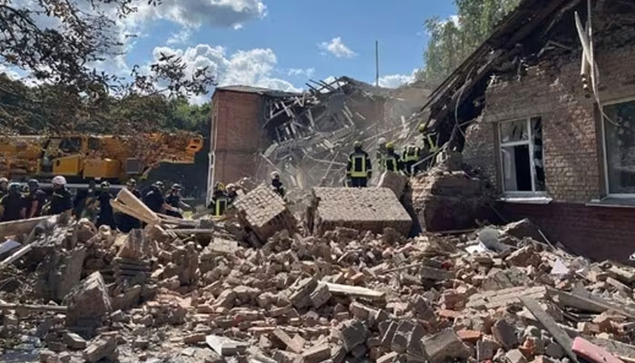 Rescuers clearing debris of a destroyed school following a Russian strike, in the town of Romny, Sumy region. — AFP/File