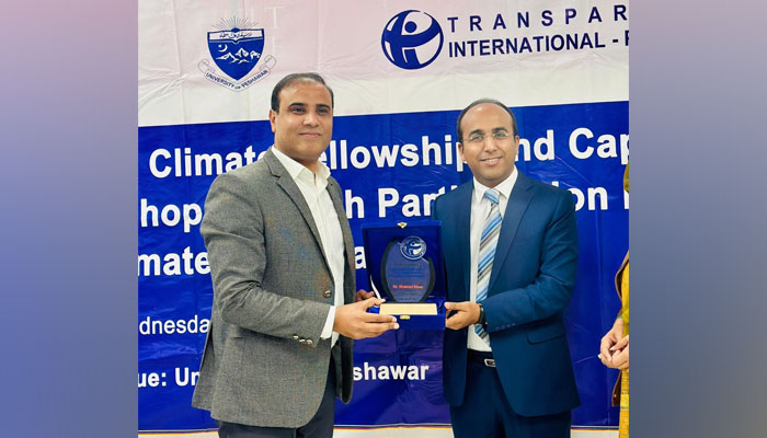 Participants present shield  during the ‘Youth Climate Fellowship Programme’ launching ceremony on February 28, 2024. — Facebook/University of Peshawar