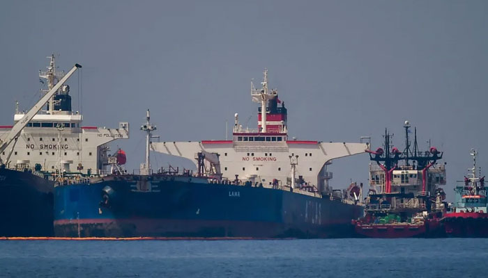 The Liberian-flagged oil tanker Ice Energy (left) transfers crude oil from the Russian-flagged oil tanker Lana (right), off the coast of Greece, on May 29, 2022. — AFP