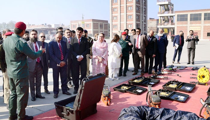 The Secretary ESD Dr Rizwan Naseer (L) briefs  (AFPGMI) Course Director Brig Nafeesa Khan at (ESD) headquarters and academy on February 28, 2024. — Facebook/Punjab Emergency Service Department