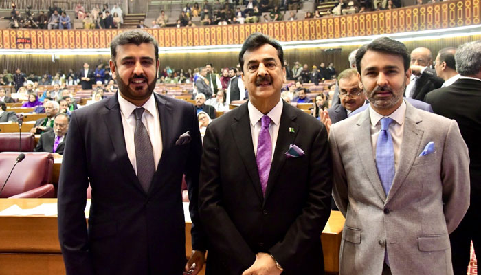Former prime minister Syed Yusuf Raza Gilani is seen along with his sons at the floor of the National Assembly. — x/Fiza_Gilani