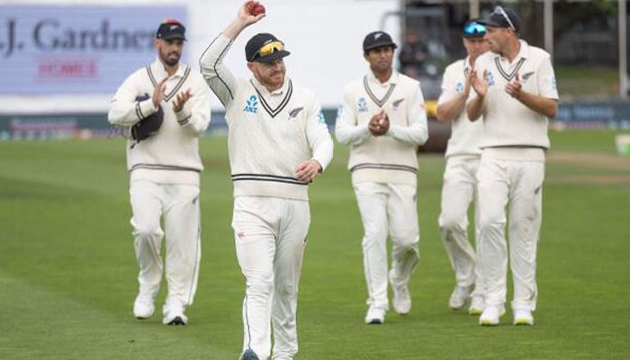 New Zealands Glenn Phillips (centre) celebrates his five wickets as he walks from the field at the end of the Australias second innings.  — AFP/File