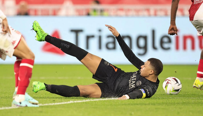 French footballer Kylian Mbappe slides during a football match. — AFP/File