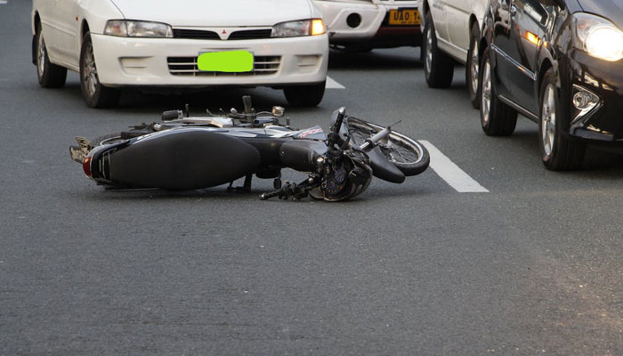 Representational image shows a motorcycle lying on the road after an accident. Pexels/File