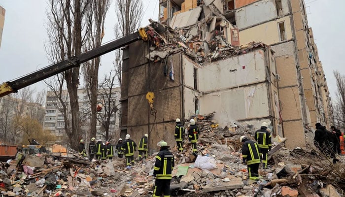Rescuers work at the site of a heavily damaged multi-story apartment building in Odesa. — AFP/File