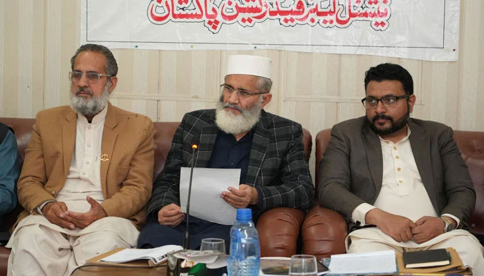 Jamaat-e-Islami Ameer Sirajul Haq (centre) talks to media after participation in the National Labour Federation meeting at Mansoorah on March 2, 2024. — Facebook/Siraj ul Haq